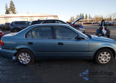 2000 Honda Civic Lx from USA, damaged, VIN 1HGEJ6674YL006485